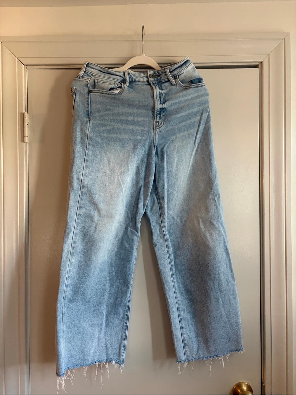High-Rise Light Blue Wide-Leg Jeans with Raw Hem